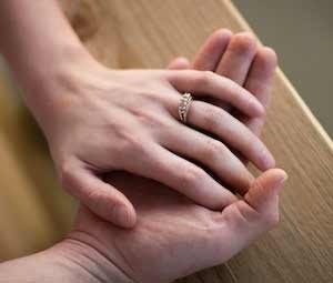 Brides hand in grooms
