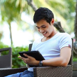 Young man using tablet